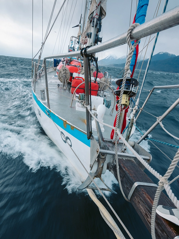 The Ksar Sailboat: The Safest Vessel for Southern Navigations in Tierra del Fuego Safety Onboard The Ksar Sailboat stands out as the safest vessel for explorations in southern waters. Equipped with the latest in safety technology, it guarantees protection on every journey. Additionally, it features advanced communication systems, including SpaceX’s Starlink satellite internet. Its robust steel hull design and advanced thermal insulation make it ideal for facing the challenges of the Antarctic climate, ensuring safe and comfortable navigation. Safety Equipment The Ksar Sailboat is equipped with crucial elements to ensure safe navigation in extreme conditions, including: Automatic Inflatable Life Jackets: Lightweight and compact, designed to inflate automatically upon contact with water, providing quick and effective flotation. Traditional Foam Life Jackets: Provide constant flotation and comfort during navigation. Emergency Lifebuoys: Equipped with rescue lines, available throughout the sailboat. Emergency Equipment Emergency Position Indicating Radio Beacon (EPIRB): Emits an emergency signal for precise localization in critical situations. Flares and Emergency Signals: Includes parachute flares, handheld flares, and smoke flares for visibility in adverse conditions. Emergency Flashlights: Robust and reliable, ensuring visibility and communication at all times. Emergency Whistles: High-powered for acoustic signaling in adverse conditions. Fire Protection Fire Extinguishers: Four strategically located and regularly inspected extinguishers. Gas and Carbon Monoxide Detectors: Provide early detection and immediate alerts. Rescue Equipment Liferaft for 8 People: Equipped with multiple safety elements. Auxiliary Dinghy with Outboard Motor: Ideal for coastal operations and explorations. Communication Equipment Emergency VHF Radios: Four VHF radios, including portable waterproof devices. Satellite Phones: Provide reliable connection in remote areas. Starlink Satellite Antenna: Ensures high-speed internet connection. Garmin Echo Sounder and GPS Map Garmin 412: Provide precise information for safe navigation. First Aid Equipment Comprehensive First Aid Kit: Equipped with bandages, antiseptics, scissors, splints, and other essential supplies. Crew Trained in First Aid: Ensures a quick and effective response in medical emergencies. These advanced pieces of equipment ensure that the Ksar Sailboat is prepared for any emergency, providing multiple options for communication and signaling in critical situations. Sailing aboard the Ksar is synonymous with safety, confidence, and readiness to face any challenge in the southern waters of Ushuaia and Tierra del Fuego.